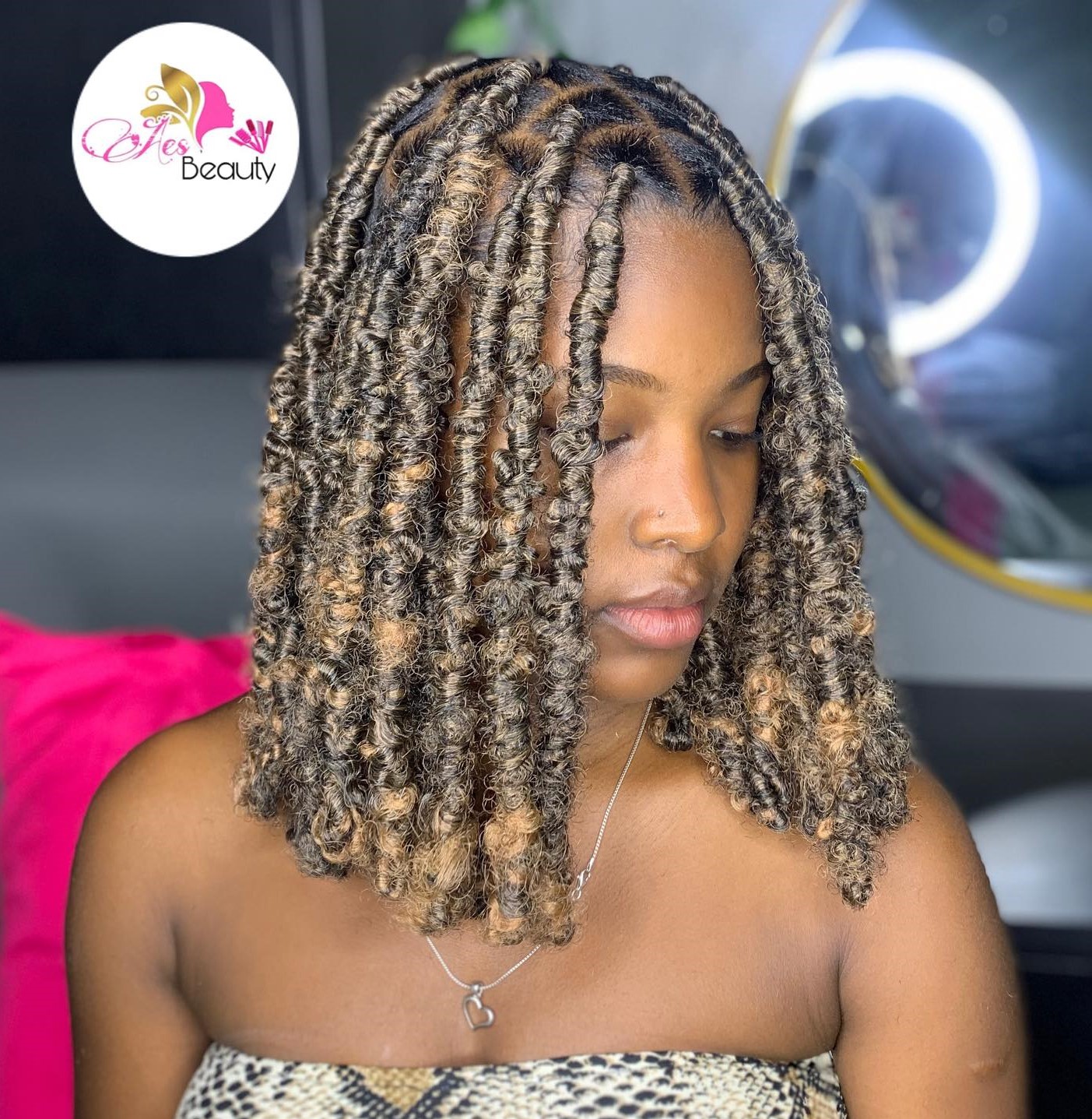 Short Butterfly Locs in Bronde Color