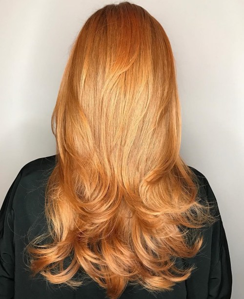 Long Strawberry Blonde Hairstyle With Layers