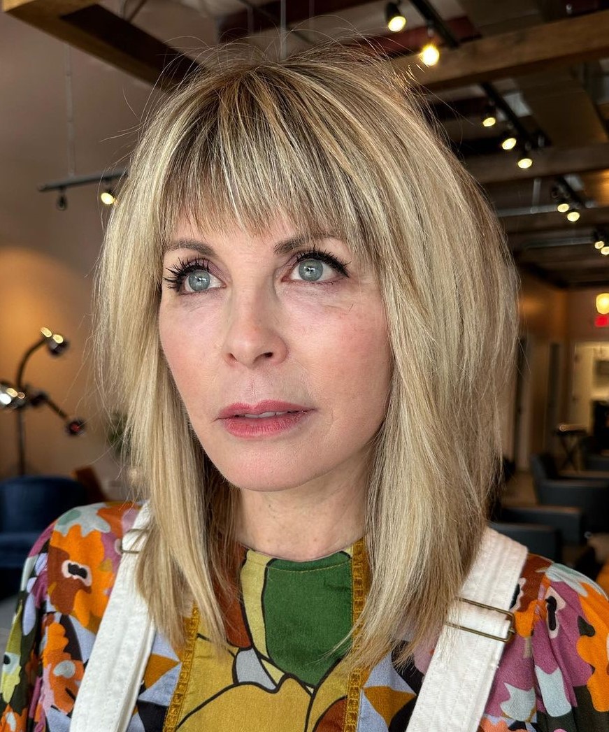 Medium Haircut with Bangs for Women over 50