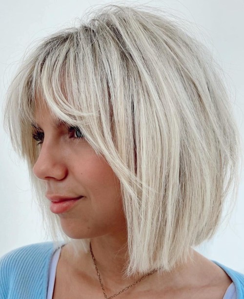 Platinum Blonde Bob with Face Framing Bangs