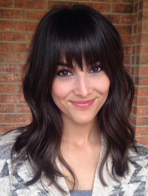 medium layered haircut with straight bangs