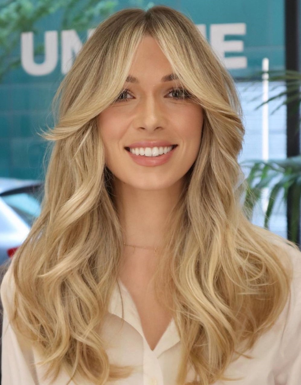 Blonde Hair with Curtain Bangs