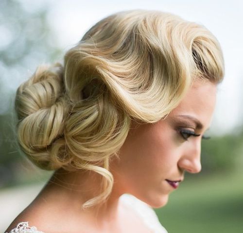 long bun with side finger wave