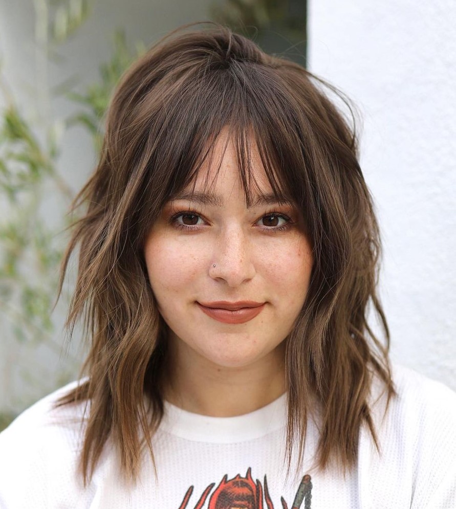 Choppy Layers and See Through Bangs Hairstyle