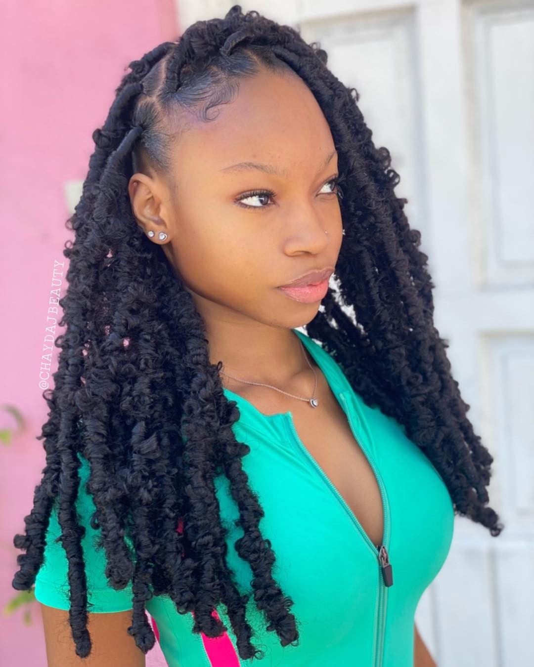 Butterfly Locs Hairstyle with Deep Side Part