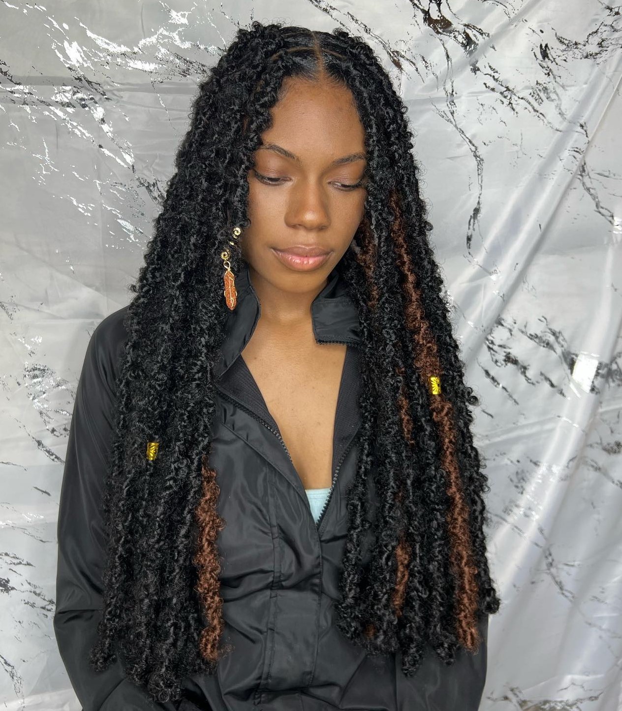Black Butterfly Locs with Brown Peek a Boo Locs