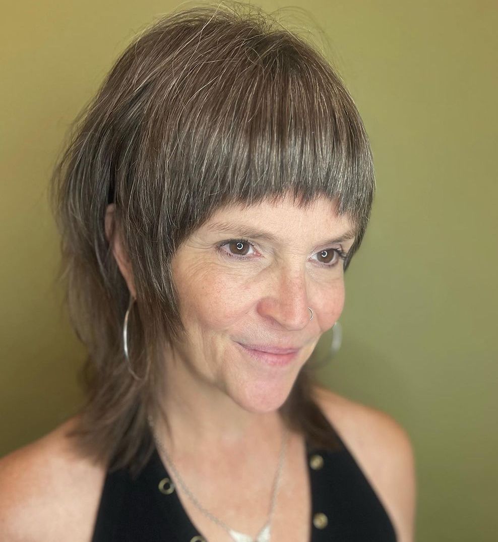 Fluffy Gray Shag with Sleek Bangs for Older Ladies