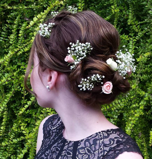 simple updo with hair flowers